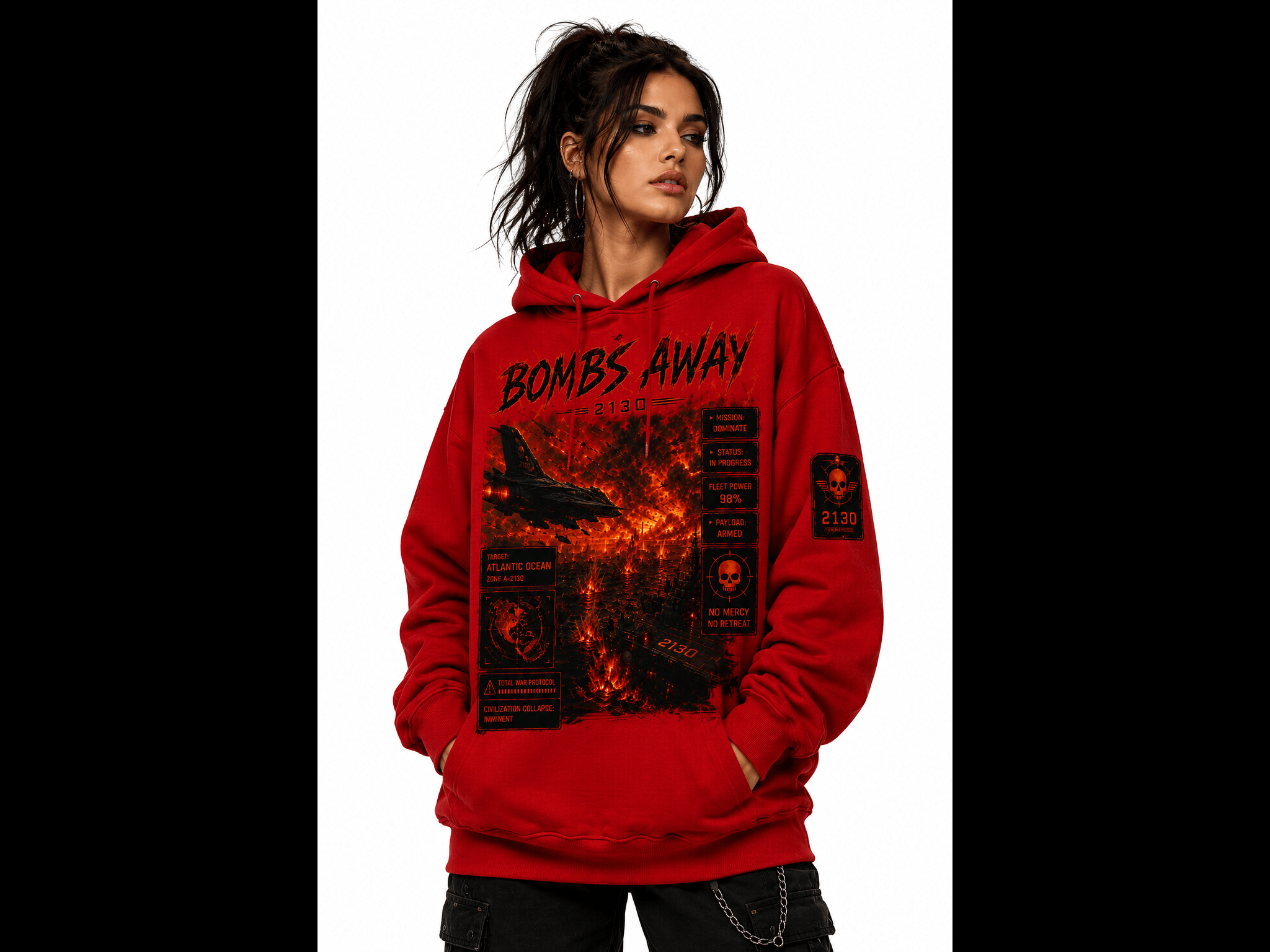Young woman in a red graphic hoodie posing with hands in pockets against a white backdrop, showcasing bold black/orange print panels on the front.