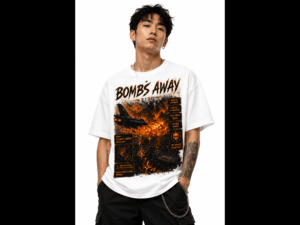 Male model wearing a white graphic T-shirt with orange and black fiery design, posing against a white background.