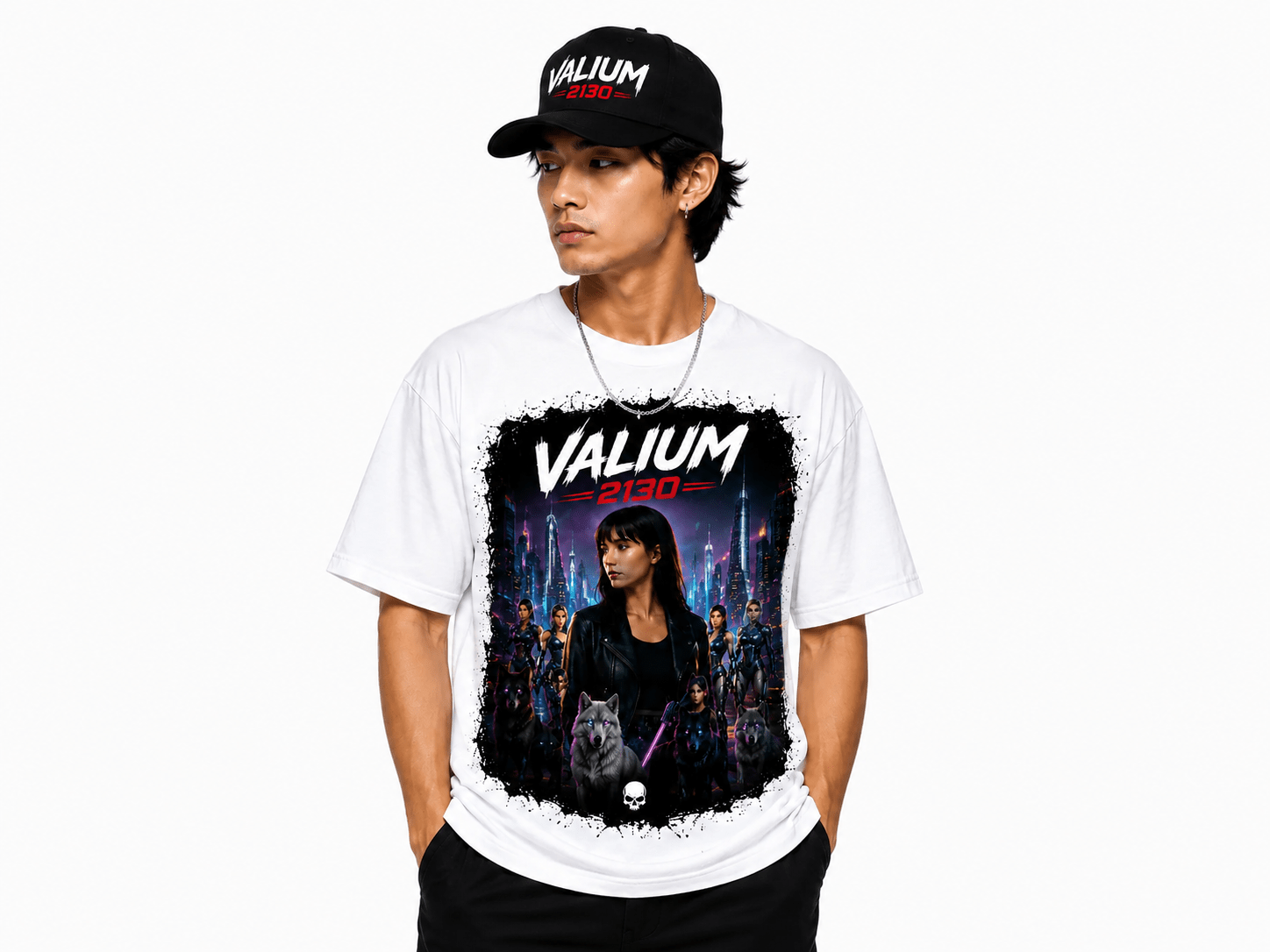 Male model wearing a white graphic T-shirt featuring a neon cityscape and 'VALIUM 2130' text, with a black cap visible.